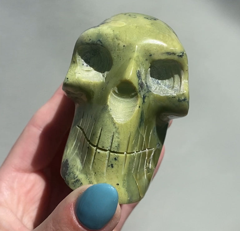 Serpentine with Pyrite Skulls