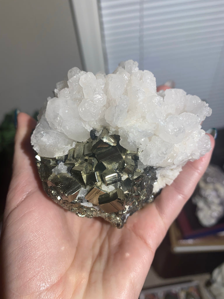 Mangano Calcite on Pyrite (UV reactive)